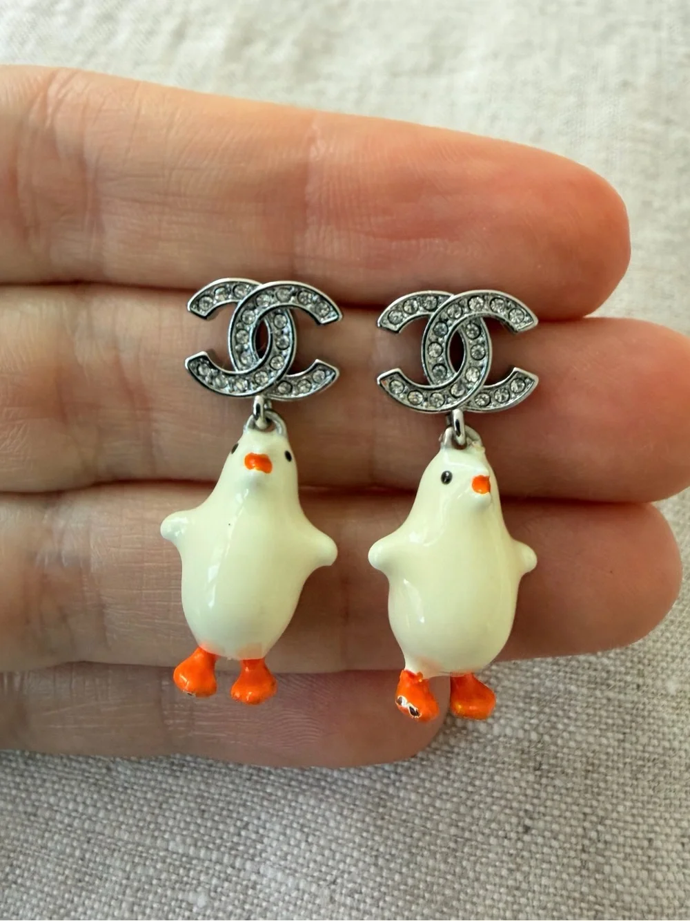 CHANEL White Enamel Chicken CC Drop Earrings with Orange Accents